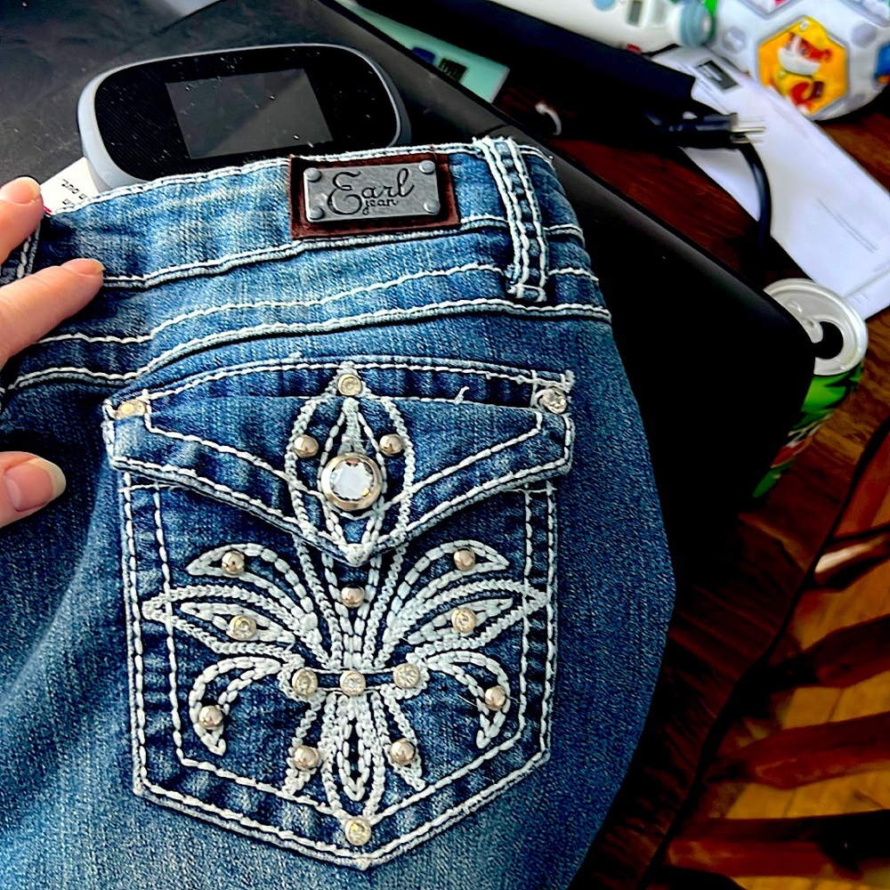 Earl jeans worn once, like new. Button sequin back pocket. Boot cut